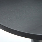 Mesa de centro redonda negra con pedestal, capacidad para 1 persona