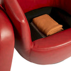 Sillón giratorio tipo barril con almacenaje en colores marrón, rojo y negro, asiento individual