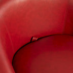 Sillón giratorio tipo barril con almacenaje en colores marrón, rojo y negro, asiento individual